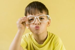 cute-child-wearing-glasses-blowing-kiss-768x576.jpg